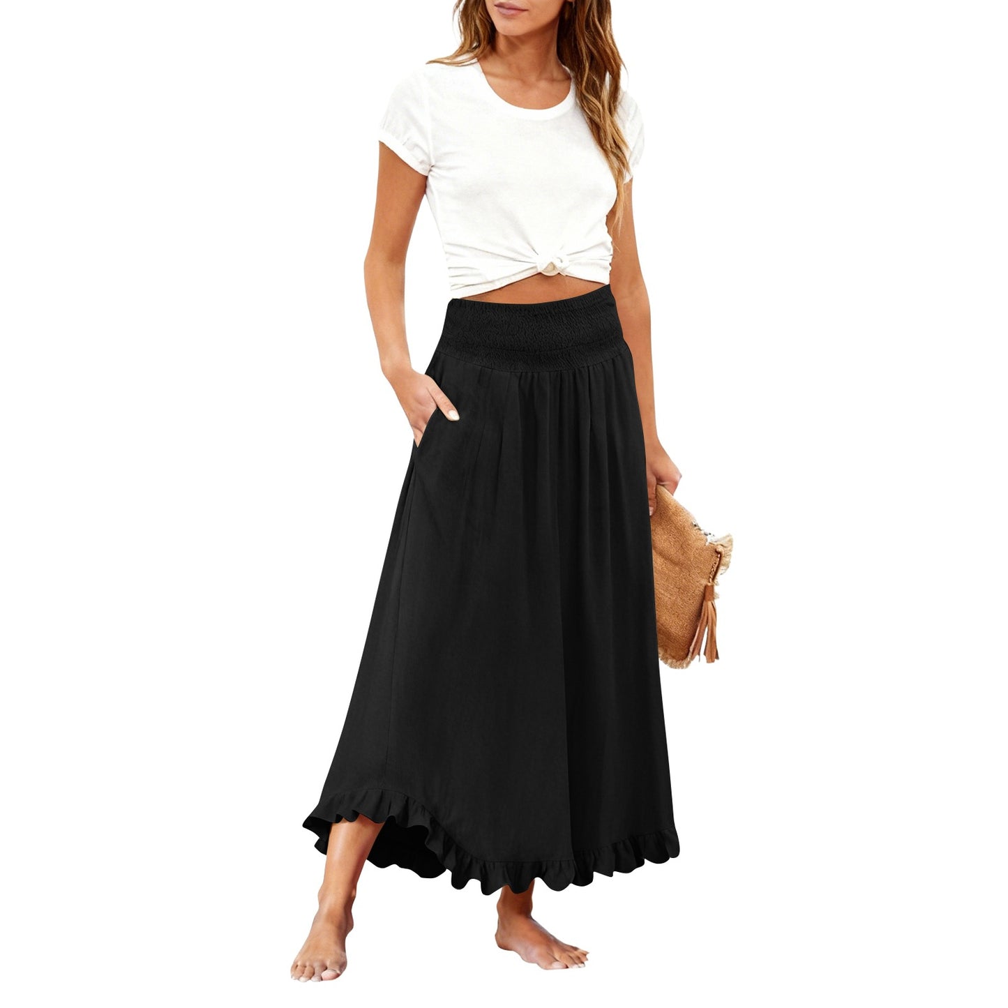 Woman wearing a black skirt and white top on a white background