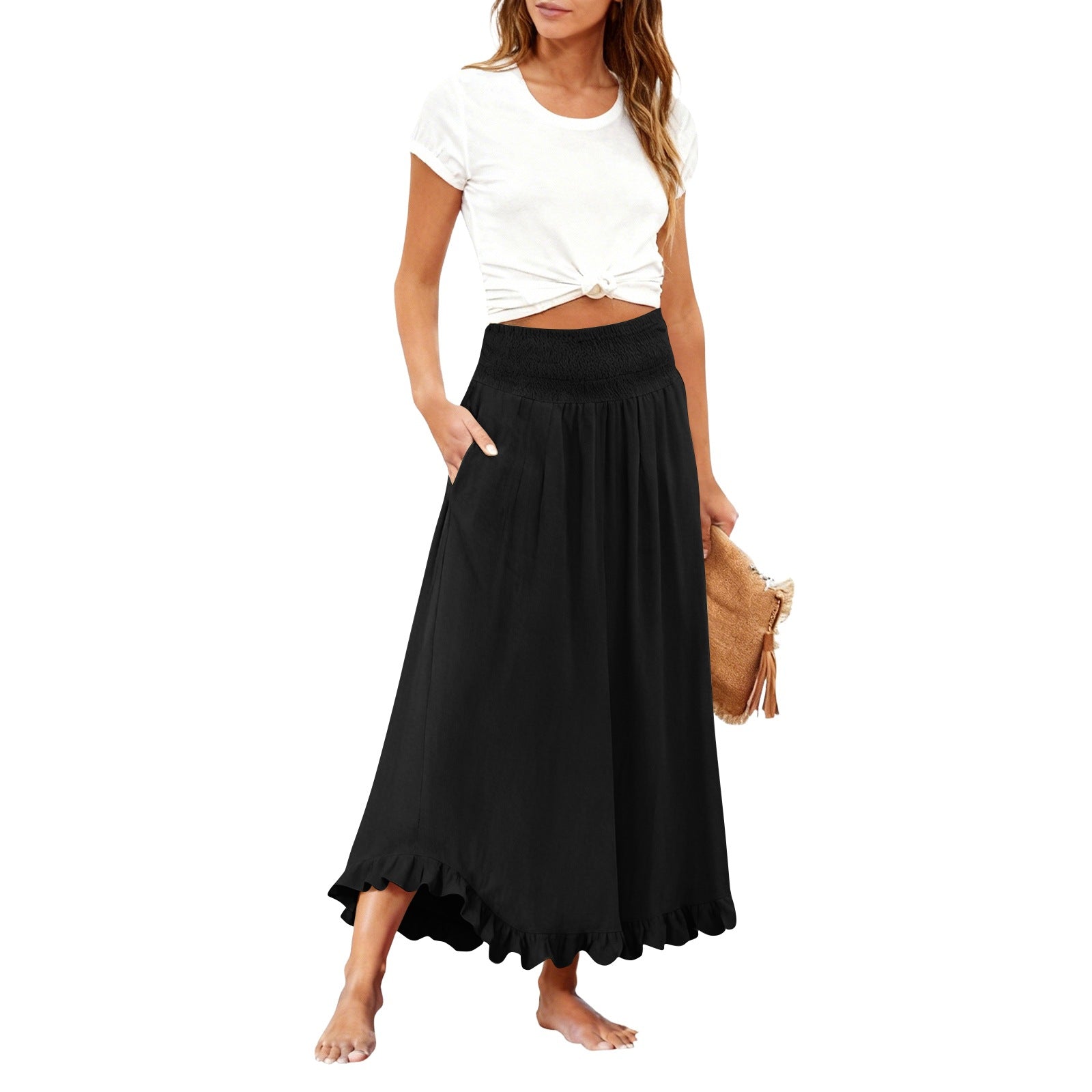 Woman wearing a black skirt and white top on a white background