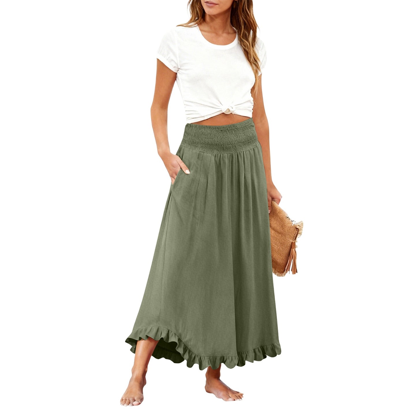 Woman wearing a white top and brown long skirt on a white background