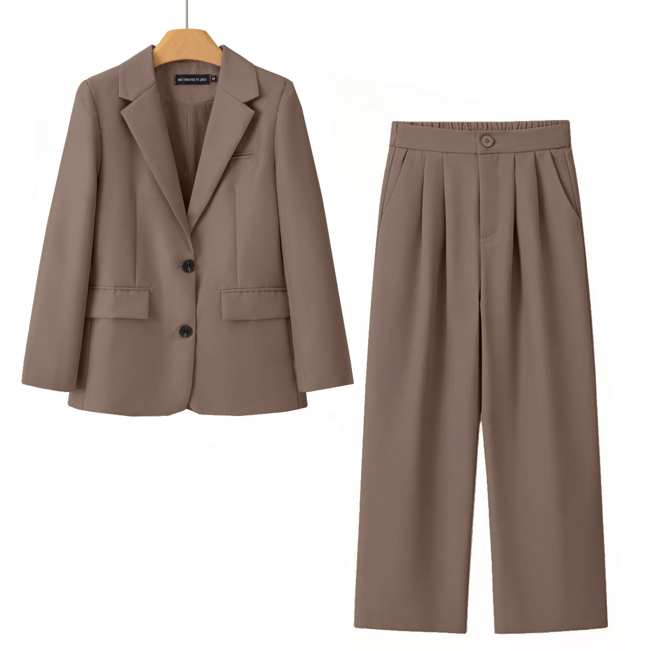 A two-piece women's suit set in a solid taupe-brown color, featuring a double-breasted blazer on a wooden hanger and matching pleated wide-leg trousers, displayed against a solid white background.